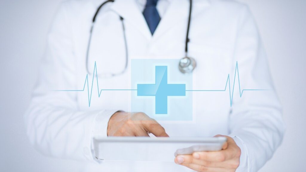Doctor checking Hospital Management Software in Tablet